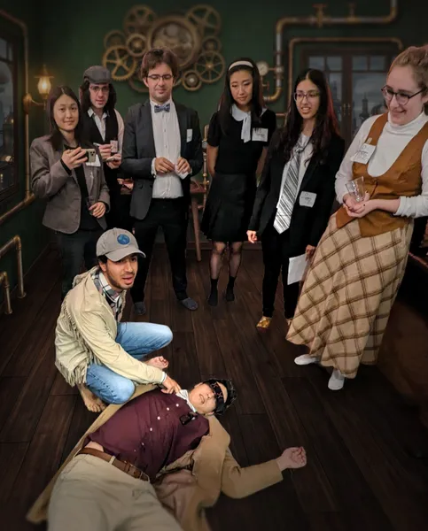 Shocked players surround a dead body
